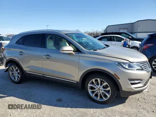 2015 Lincoln MKC with VIN 5LMTJ2AH0FUJ19784, listed as a Copart auction lot 51112455 with 72,123 mi miles and Salvage Title. Bid and sale history available at DreamBid. Image 4.