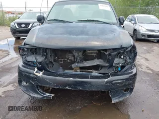2002 Ford F-150 XL with VIN 1FTRF17222NB42472, listed as a IAAI auction lot 42465261 with 148,948 mi miles and . Bid and sale history available at DreamBid. Image 6.