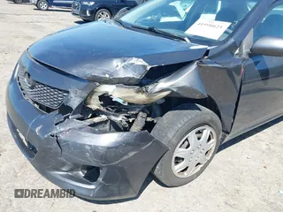 2010 Toyota Corolla with VIN 2T1BU4EE2AC337981, listed as a IAAI auction lot 41998621 with 153,295 mi miles and . Bid and sale history available at carsss.com. Image 6.
