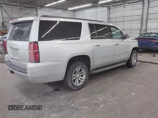 2018 Chevrolet Suburban LT z VIN 1GNSKHKC2JR201282, wystawiony jako IAAI lot #41312994 z przebiegiem 99 783 mil mil oraz . Historia ofert i sprzedaży dostępna na DreamBid. Obrazek 4.