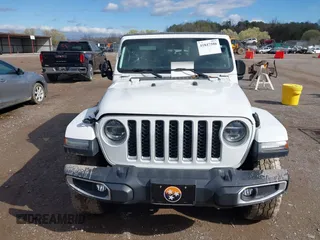 2020 Jeep Gladiator Overland with VIN 1C6HJTFG1LL107641, listed as a IAAI auction lot 41847586 with 69,664 mi miles and . Bid and sale history available at DreamBid. Image 12.