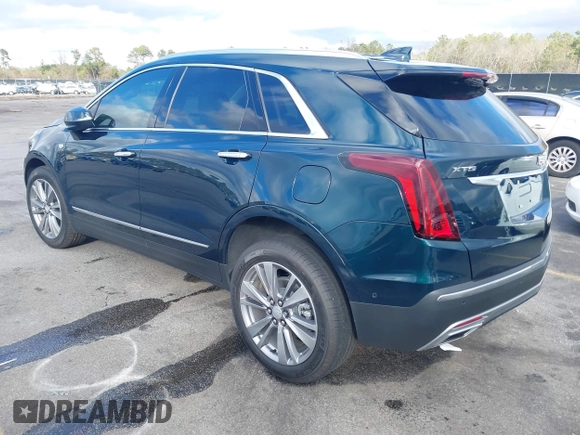 2024 Cadillac XT5 FWD Premium Luxury with VIN 1GYKNCR45RZ733939, listed as a IAAI auction lot 41224515 with 6,945 mi miles. Bid and sale history available at carsss.com. Image 3.