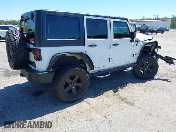 2016 Jeep Wrangler Unlimited Sport with VIN 1C4BJWDG3GL282787, listed as a IAAI auction lot 41849527 with 75,578 mi miles and . Bid and sale history available at DreamBid. Image 4.