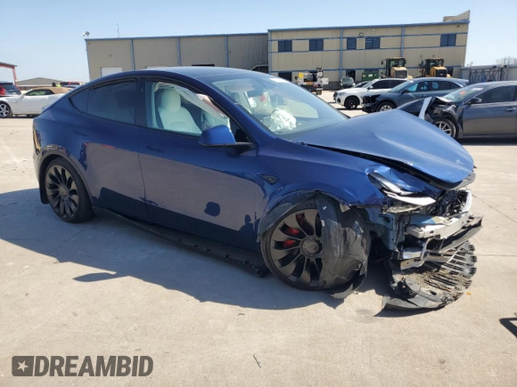 2023 Tesla Model Y Performance with VIN 7SAYGDEF5PF917808, listed as a Copart auction lot 48348615 with Not Provided miles and Salvage Title. Bid and sale history available at DreamBid. Image 4.