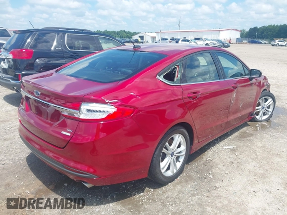 2018 Ford Fusion SE with VIN 3FA6P0HD7JR258701, listed as a IAAI auction lot 42637023 with 150,471 mi miles and . Bid and sale history available at DreamBid. Image 4.