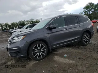 2020 Honda Pilot Touring 7-Passenger with VIN 5FNYF6H6XLB065893, listed as a Copart auction lot 55931605 with 76,932 mi miles and Salvage title. Bid and sale history available at DreamBid. Image 1.