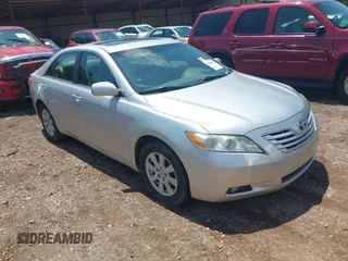 2009 Toyota Camry LE z VIN 4T1BK46K49U592233, wystawiony jako IAAI lot #42205847 z przebiegiem 141 226 mil mil oraz . Historia ofert i sprzedaży dostępna na DreamBid. Obrazek 1.