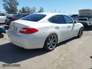 2013 Infiniti M37 with VIN JN1BY1AP6DM511104, listed as a IAAI auction lot 41818184 with 138,605 mi miles. Bid and sale history available at carsss.com. Image 4.