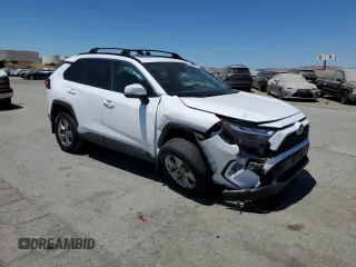 2022 Toyota RAV4 XLE with VIN 2T3W1RFV8NW233397, listed as a Copart auction lot 65276715 with 20,956 mi miles and Salvage title. Bid and sale history available at DreamBid. Image 4.