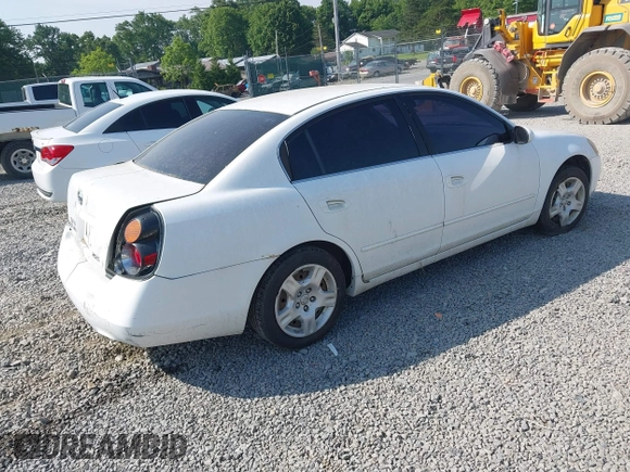 2002 Nissan Altima SL z VIN 1N4AL11DX2C279807, wystawiony jako IAAI lot #42482548 z przebiegiem 208 233 mil mil oraz . Historia ofert i sprzedaży dostępna na DreamBid. Obrazek 4.