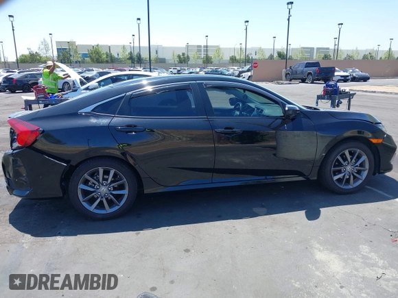 2019 Honda Civic EX z VIN 19XFC1F3XKE215534, wystawiony jako IAAI lot #42100714 z przebiegiem 31 808 mil mil oraz . Historia ofert i sprzedaży dostępna na DreamBid. Obrazek 13.