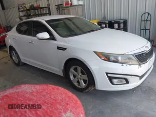 2015 Kia Optima LX z VIN KNAGM4A79F5528215, wystawiony jako IAAI lot #42317163 z przebiegiem 215 395 mil mil oraz . Historia ofert i sprzedaży dostępna na DreamBid. Obrazek 1.