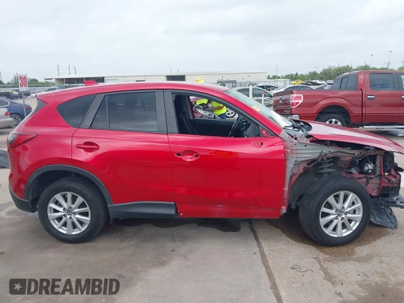 2015 Mazda CX-5 Touring with VIN JM3KE2CY3F0459076, listed as a IAAI auction lot 41913044 with 83,960 mi miles. Bid and sale history available at carsss.com. Image 14.