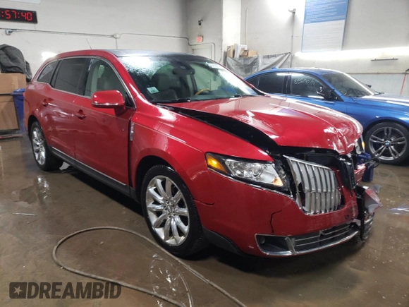 2012 Lincoln MKT EcoBoost with VIN 2LMHJ5AT9CBL54172, listed as a Copart auction lot 85450294 with 55,548 mi miles and Salvage Title. Bid and sale history available at DreamBid. Image 4.