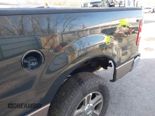 2005 Ford F-150 XLT with VIN 1FTPX14505FB72622, listed as a IAAI auction lot 41823532 with 165,918 mi miles. Bid and sale history available at carsss.com. Image 14.