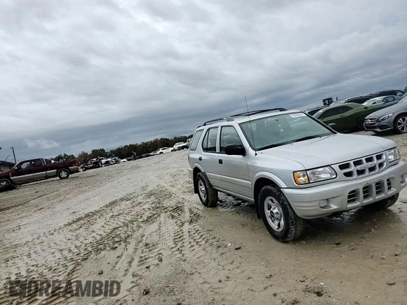 2000 Isuzu Rodeo z VIN 4S2DM58WXY4346884, wystawiony jako Copart lot #43108675 z przebiegiem 144 306 mil mil oraz Nie do naprawy. Historia ofert i sprzedaży dostępna na DreamBid. Obrazek 12.