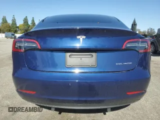 2023 Tesla Model 3 Long Range with VIN 5YJ3E1EB3PF633070, listed as a Copart auction lot 48942545 with 38,332 mi miles and Salvage Title. Bid and sale history available at DreamBid. Image 6.