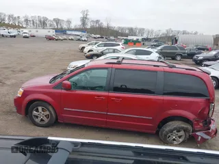 2009 Dodge Grand Caravan SXT z VIN 2D8HN54X69R593635, wystawiony jako IAAI lot #39235325 z przebiegiem 207 996 mil mil oraz . Historia ofert i sprzedaży dostępna na DreamBid. Obrazek 14.