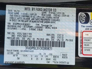2012 Ford Fusion Hybrid z VIN 3FADP0L31CR380821, wystawiony jako IAAI lot #42332256 z przebiegiem 59 431 mil mil oraz . Historia ofert i sprzedaży dostępna na DreamBid. Obrazek 9.