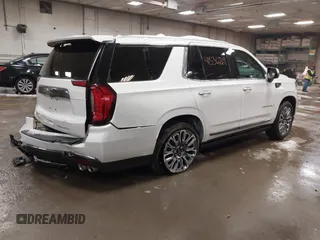 2023 GMC Yukon Denali Ultimate with VIN 1GKS2EKL5PR329276, listed as a IAAI auction lot 41536269 with 38,406 mi miles. Bid and sale history available at carsss.com. Image 4.