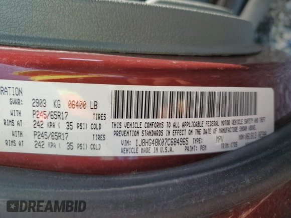 2007 Jeep Commander Sport with VIN 1J8HG48K07C684965, listed as a Copart auction lot 58061005 with 208,951 mi miles and Salvage title. Bid and sale history available at DreamBid. Image 14.
