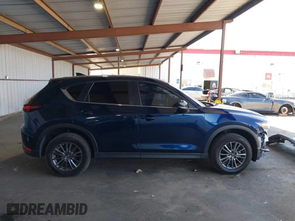 2020 Mazda CX-5 Touring z VIN JM3KFACM2L0802461, wystawiony jako IAAI lot #42148039 z przebiegiem 57 963 mil mil oraz . Historia ofert i sprzedaży dostępna na DreamBid. Obrazek 14.