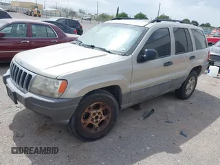 2003 Jeep Grand Cherokee Laredo with VIN 1J4GX48S73C515727, listed as a IAAI auction lot 42555080 with 275,035 mi miles and . Bid and sale history available at DreamBid. Image 2.