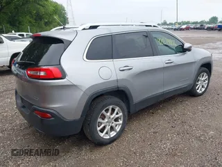 2014 Jeep Cherokee Latitude z VIN 1C4PJLCB3EW101628, wystawiony jako IAAI lot #42274896 z przebiegiem 174 624 mil mil oraz . Historia ofert i sprzedaży dostępna na DreamBid. Obrazek 4.