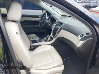 2013 Cadillac SRX Performance Collection z VIN 3GYFNDE35DS555248, wystawiony jako IAAI lot #42001494 z przebiegiem 268 410 mil mil oraz . Historia ofert i sprzedaży dostępna na DreamBid. Obrazek 5.
