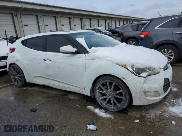 2012 Hyundai Veloster w/Red Int with VIN KMHTC6AD5CU030340, listed as a Copart auction lot 45793405 with 139,667 mi miles and Clean title. Bid and sale history available at DreamBid. Image 4.