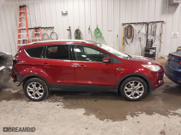 2015 Ford Escape Titanium with VIN 1FMCU9JX1FUA16707, listed as a IAAI auction lot 41536305 with 110,448 mi miles. Bid and sale history available at carsss.com. Image 13.