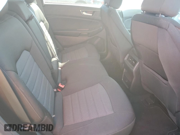 2021 Ford Edge SE z VIN 2FMPK4G98MBA23711, wystawiony jako Copart lot #76259054 z przebiegiem 20 879 mil mil oraz Czysty tytuł • Clean title. Historia ofert i sprzedaży dostępna na DreamBid. Obrazek 11.