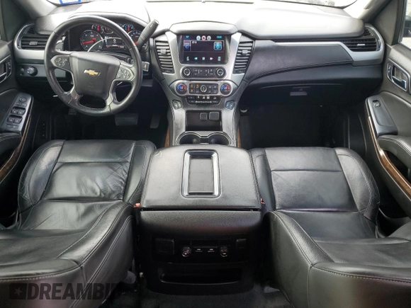 2015 Chevrolet Tahoe LT with VIN 1GNSCBKC9FR220574, listed as a Copart auction lot 54788555 with 244,491 mi miles and Salvage title. Bid and sale history available at DreamBid. Image 8.