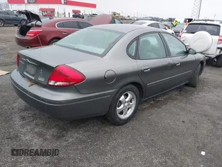 2004 Ford Taurus SE with VIN 1FAFP53254A204492, listed as a IAAI auction lot 41543153 with 70,395 mi miles and . Bid and sale history available at DreamBid. Image 4.