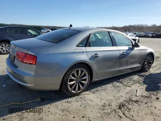 2013 Audi A8 3.0L with VIN WAUAGAFD6DN012546, listed as a Copart auction lot 82210024 with 121,004 mi miles and Clean title. Bid and sale history available at DreamBid. Image 3.
