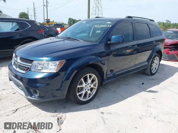 2014 Dodge Journey SXT with VIN 3C4PDCBG3ET218328, listed as a IAAI auction lot 42086656 with 55,620 mi miles. Bid and sale history available at carsss.com. Image 2.