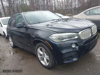 2014 BMW X5 xDrive50i with VIN 5UXKR6C59E0C03597, listed as a IAAI auction lot 41866944 with 65,890 mi miles. Bid and sale history available at carsss.com. Image 1.