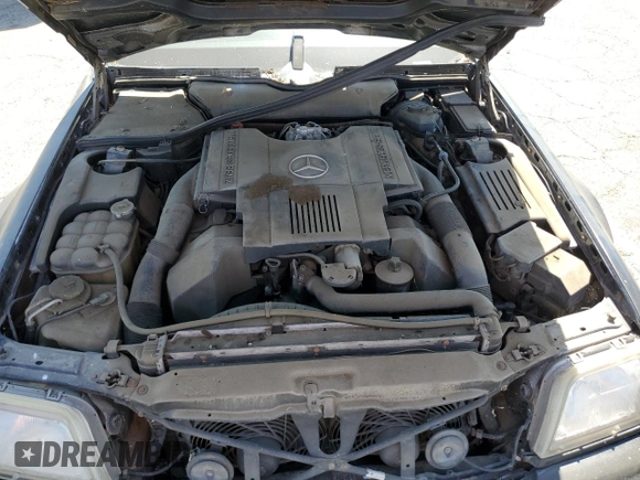 1992 Mercedes-Benz 500 z VIN WDBFA66E9NF050217, wystawiony jako Copart lot #58065965 z przebiegiem 143 456 mil mil oraz Tytuł czysty. Historia ofert i sprzedaży dostępna na DreamBid. Obrazek 11.