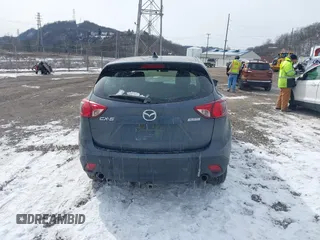 2013 Mazda CX-5 Sport z VIN JM3KE2BE9D0156274, wystawiony jako IAAI lot #41624466 z przebiegiem 159 017 mil mil oraz . Historia ofert i sprzedaży dostępna na DreamBid. Obrazek 16.