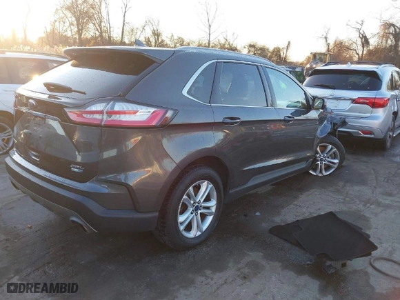 2020 Ford Edge SEL with VIN 2FMPK4J91LBA70604, listed as a IAAI auction lot 41002567 with 123,050 mi miles. Bid and sale history available at carsss.com. Image 4.