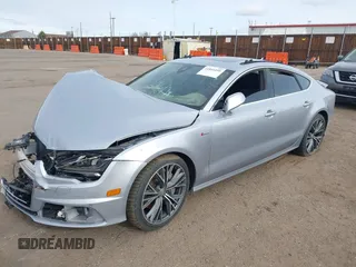 2016 Audi A7 3.0 Prestige with VIN WAU2GAFC4GN040099, listed as a IAAI auction lot 41844495 with 76,133 mi miles. Bid and sale history available at carsss.com. Image 2.