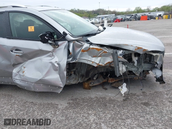 2014 Mazda CX-5 Touring with VIN JM3KE4CY1E0426409, listed as a IAAI auction lot 41924258 with 116,956 mi miles. Bid and sale history available at carsss.com. Image 12.