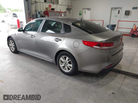 2016 Kia Optima LX with VIN 5XXGT4L33GG026183, listed as a IAAI auction lot 42156799 with 163,000 mi miles and . Bid and sale history available at carsss.com. Image 3.