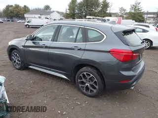 2021 BMW X1 xDrive28i with VIN WBXJG9C06M5S05303, listed as a IAAI auction lot 41060130 with 29,644 mi miles. Bid and sale history available at carsss.com. Image 3.