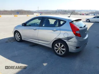 2012 Hyundai Accent SE with VIN KMHCU5AE0CU021092, listed as a IAAI auction lot 41789027 with 137,557 mi miles. Bid and sale history available at carsss.com. Image 3.