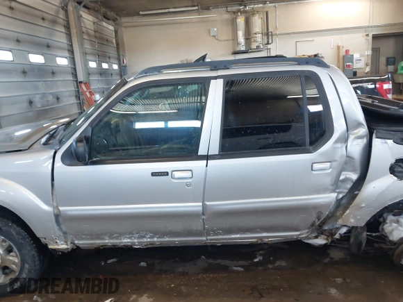 2004 Ford Explorer Sport Trac XLS z VIN 1FMZU77K84UB99207, wystawiony jako IAAI lot #41621860 z przebiegiem 126 634 mil mil oraz . Historia ofert i sprzedaży dostępna na DreamBid. Obrazek 15.