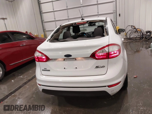 2017 Ford Fiesta SE with VIN 3FADP4BJ5HM156141, listed as a IAAI auction lot 42085359 with 52,015 mi miles and . Bid and sale history available at DreamBid. Image 16.