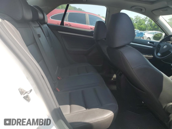 2009 Volkswagen Jetta SE z VIN 3VWRZ71K29M033787, wystawiony jako Copart lot #61969945 z przebiegiem 175 785 mil mil oraz Szkoda całkowita • Salvage title. Historia ofert i sprzedaży dostępna na DreamBid. Obrazek 10.