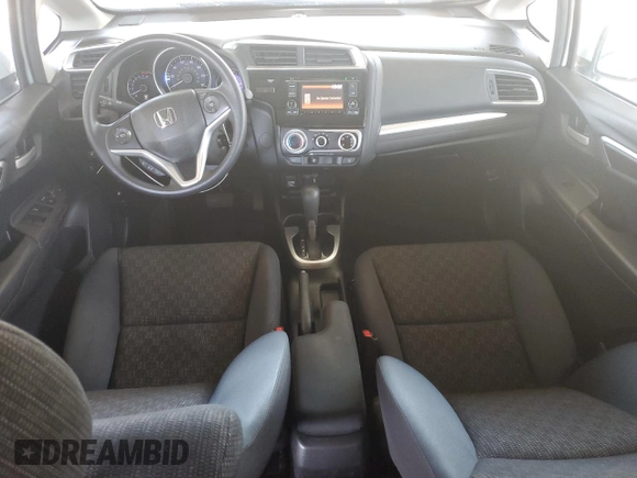 2016 Honda Fit LX with VIN JHMGK5H58GX031938, listed as a Copart auction lot 63101705 with 102,138 mi miles and Salvage title. Bid and sale history available at DreamBid. Image 8.