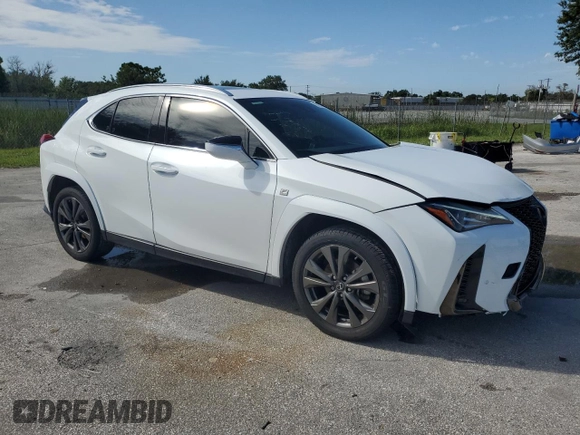 2022 Lexus UX with VIN JTHE3JBHXN2048153, listed as a Copart auction lot 67904334 with 50,346 mi miles and Salvage Title. Bid and sale history available at carsss.com. Image 4.